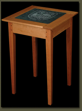 Make a lasting impression in your corporate gift giving by choosing a gift that reflects your own committment to excellence -- the Vermont Soapstone End Table from Clarner Woodworks