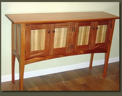 Our Myrtle Madness Sideboard is made with two uniquely beautiful woods:  Ribbon Mahongany and Myrtle